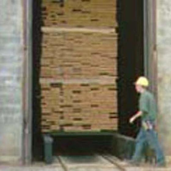 Newly sawn timber is seasoned in a kiln