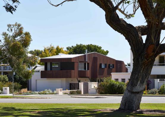 a house with a tree in the background