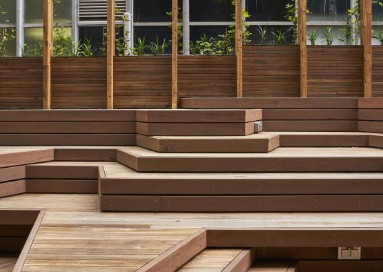 a wooden stairs outside a building