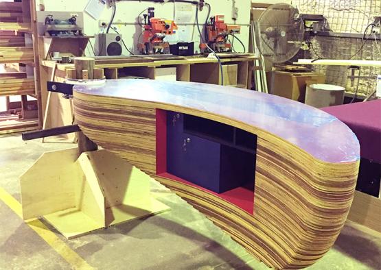 a wooden table in a workshop