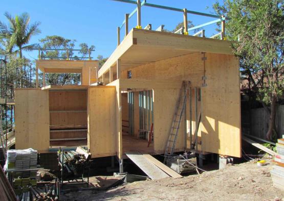 a building under construction with a ladder