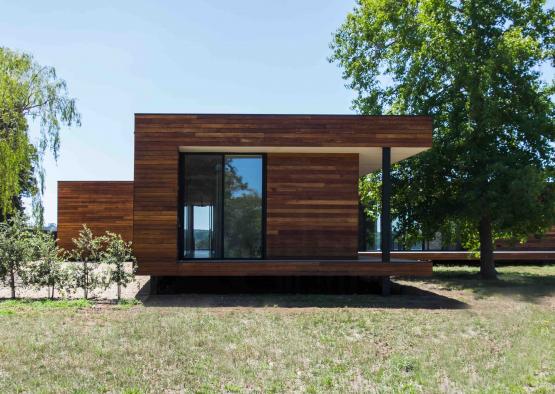 a building with a wood paneled roof