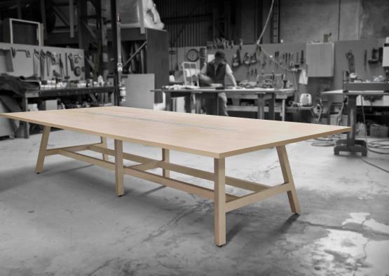 a large wooden table in a workshop