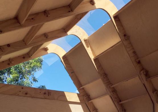 a wooden structure with a clear sky