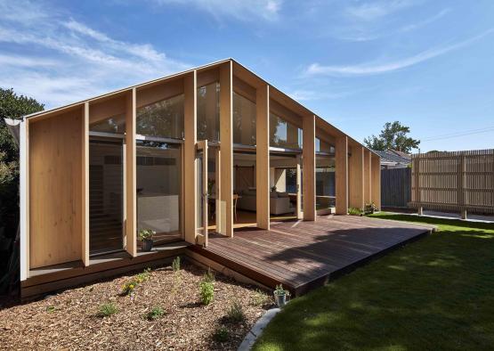 a house with a deck and a patio