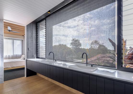 a bathroom with a large window