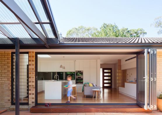 a child walking in a house