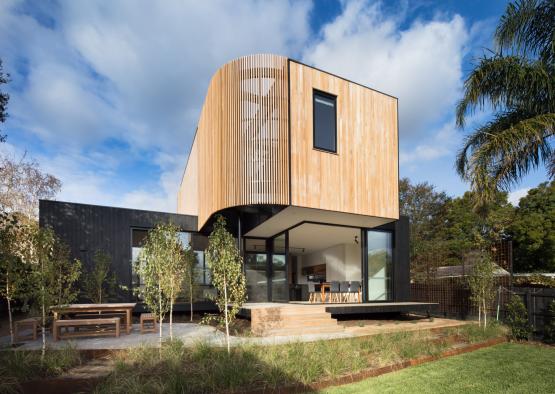 a house with a wooden wall and a wooden floor