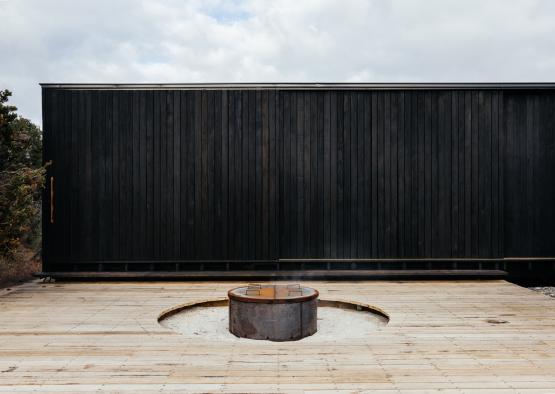 a fire pit on a wood floor