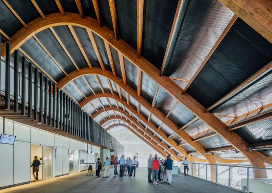 a group of people standing in a building