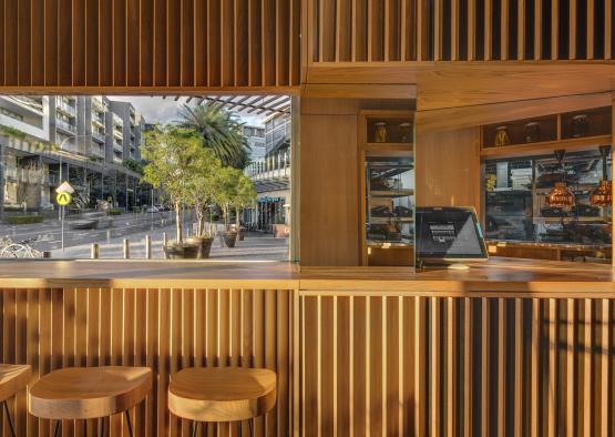 a window with a bar and stools