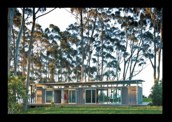 a house with trees in the background