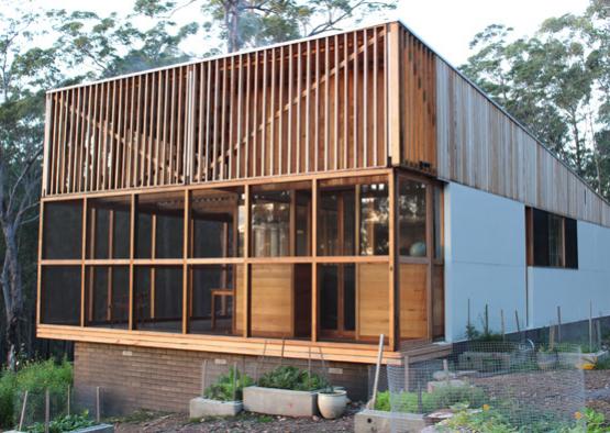 a house with a wood paneled roof