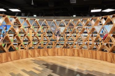 a display of shoes on shelves