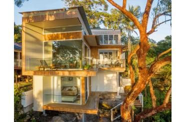 a house with a tree in the background