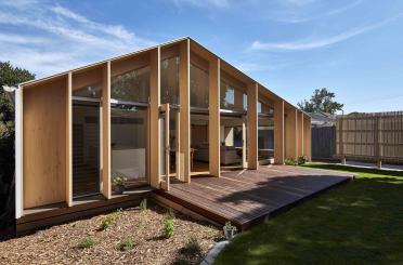 a house with a deck and a patio