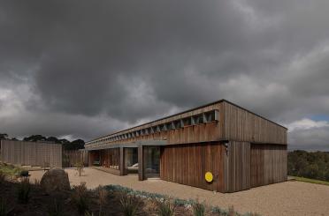 a building with a cloudy sky