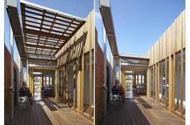 a wooden deck with a wood pergola