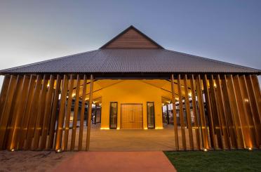 a building with a roof and a walkway