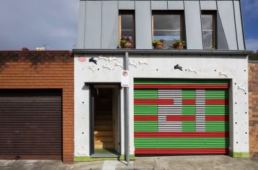 a building with a garage door