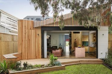 a house with a deck and a patio