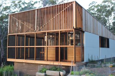 a house with a wood paneled roof