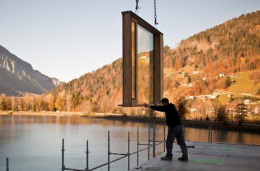 a man holding a rectangular window